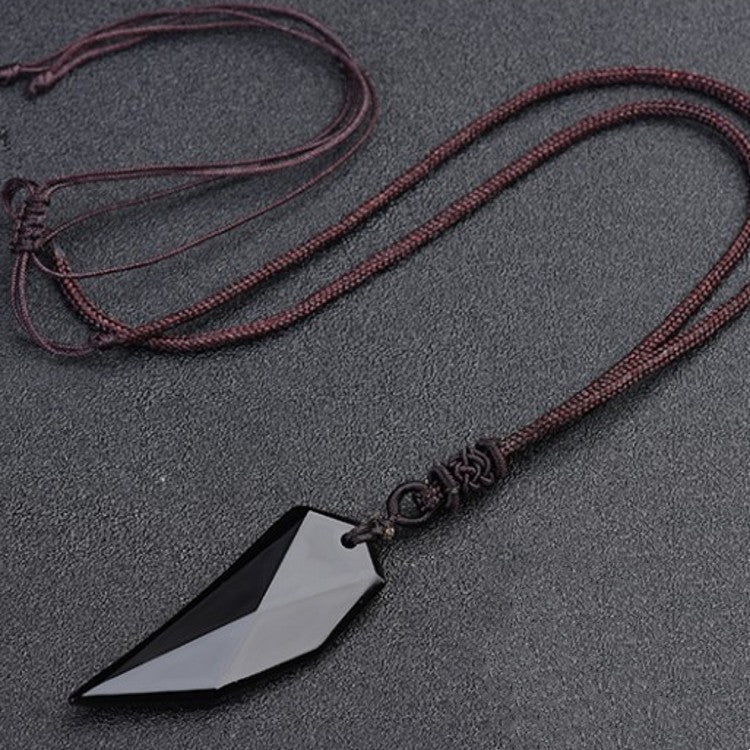 Force Ancestrale : Pendentifs Dent de Loup en Obsidienne - Karmisya