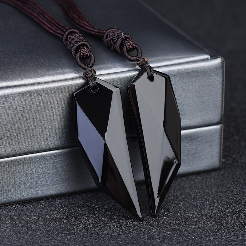 Force Ancestrale : Pendentifs Dent de Loup en Obsidienne - Karmisya